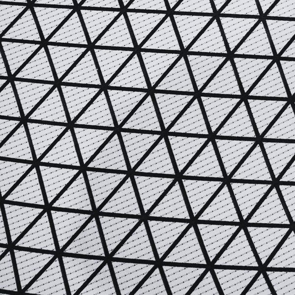 A technical close-up of the high-performance rash guard material showing a breathable black triangular mesh overlaying a grey moisture-wicking fabric.